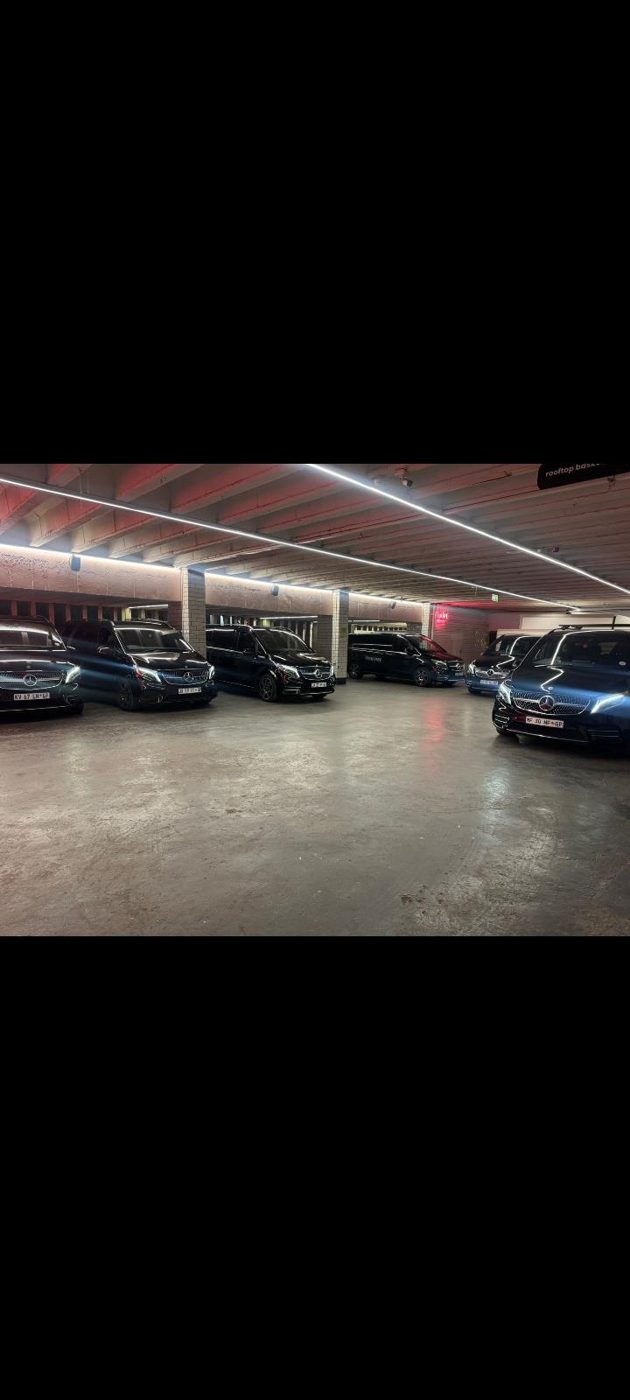 Fleet of executive vans outside a depot