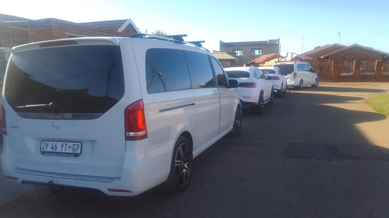 Executive van parked at a residence